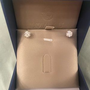 6.5mm moissanite studs with 14k solid gold.